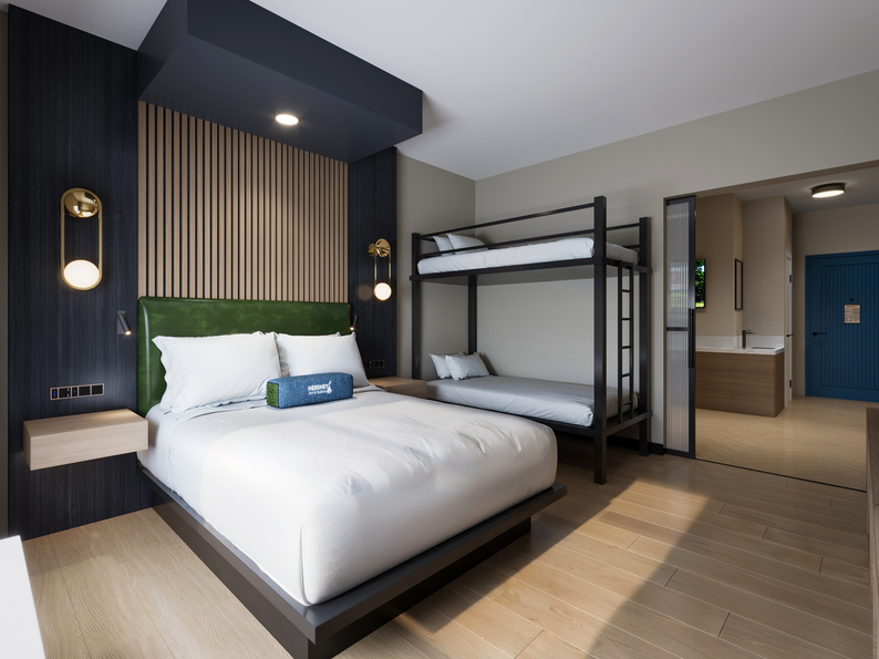 A room with a Queen and Bunk Beds at the Hershey Inn & Suites