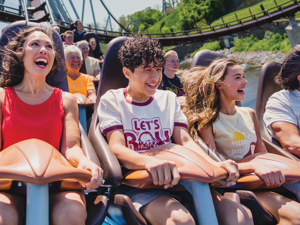 A family riding a rollercoaster at Hersheypark.