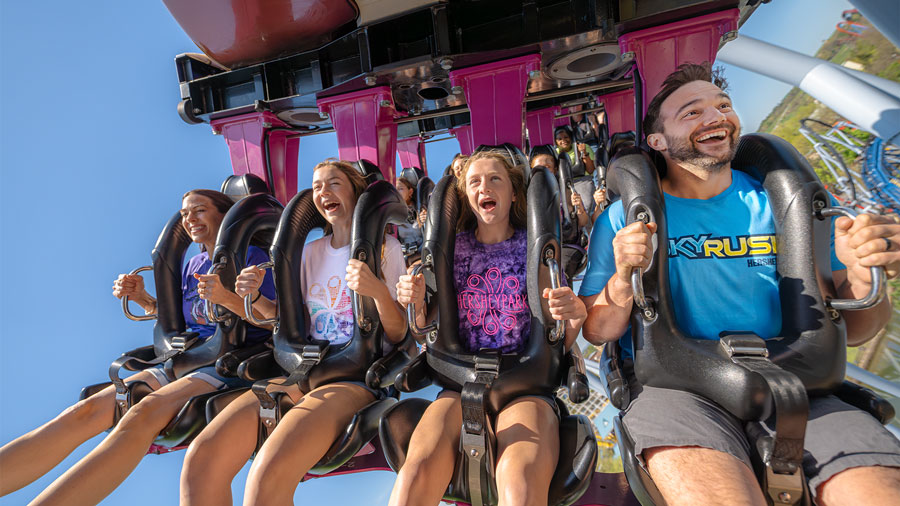 Family with Hershey Bar character at Hersheypark